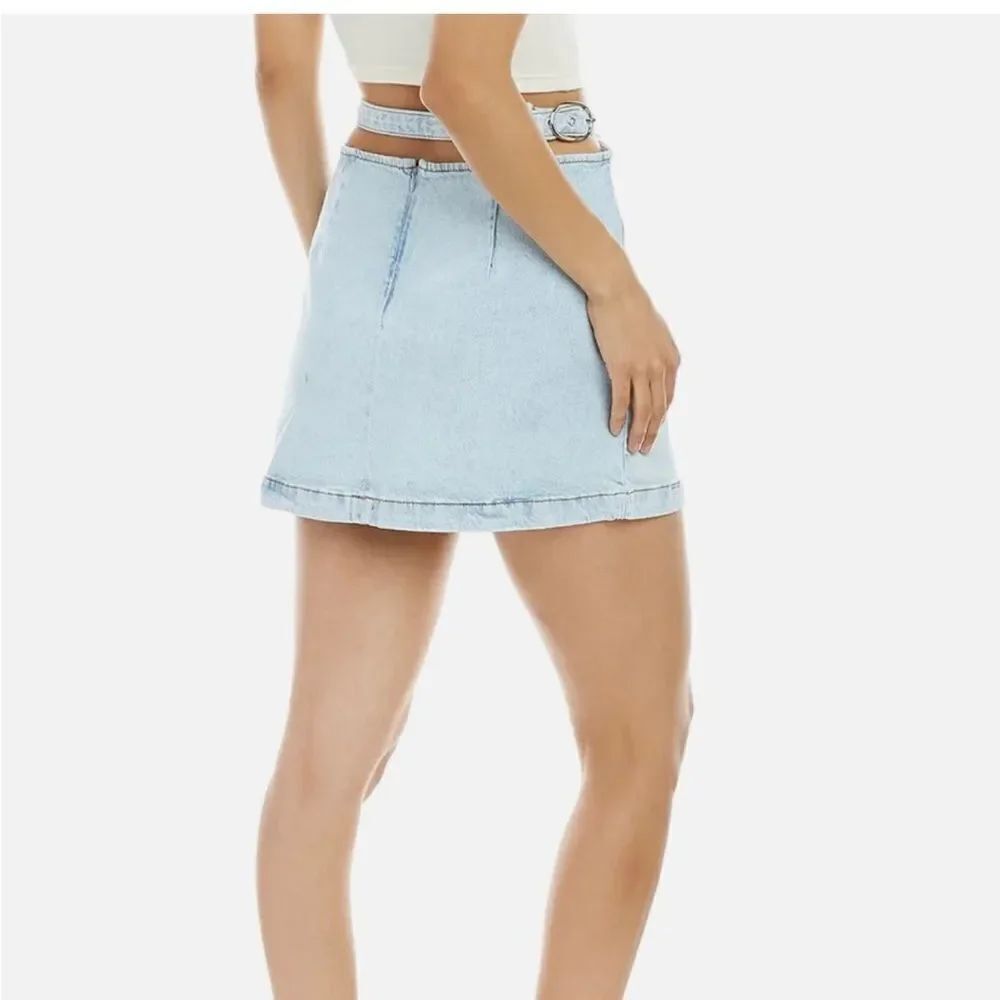 We Wore What Cut Out Light Denim Mini Skirt sz L NWT
